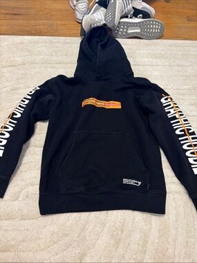 TNA Black Hoodie with Orange Graphic Stripe